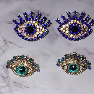 TWO PAIRS OF FANTASY EYE EARRINGS